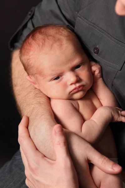 Newborn infant with father — Stock Photo, Image