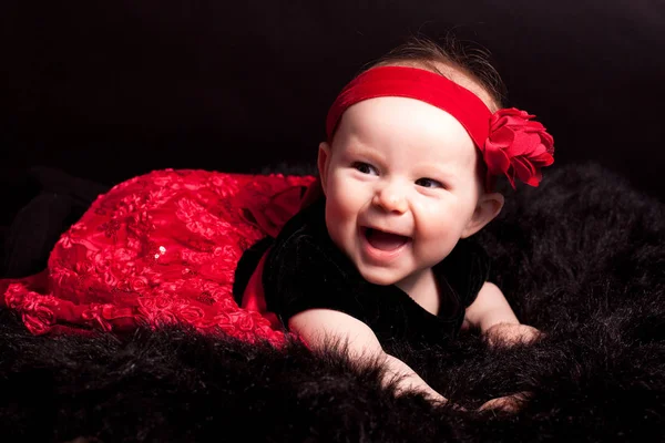 Cute young baby in dress in studio — Stock Photo, Image