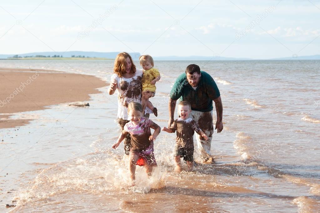 family playing and splashing 