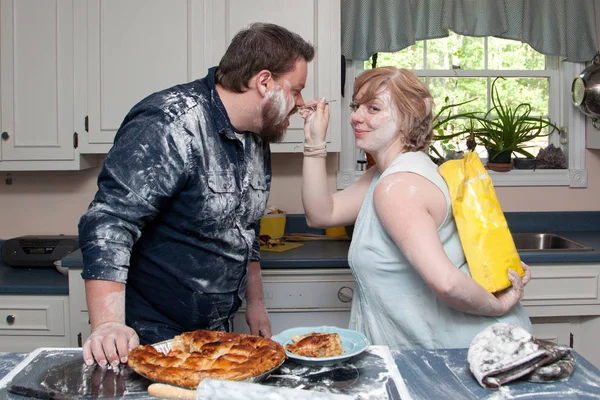 husband and wife in food fight