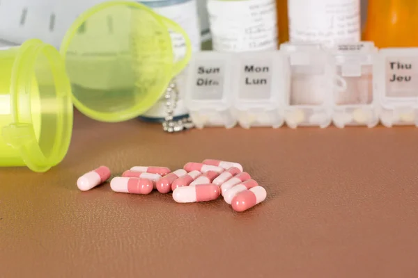 Pills and medication bottle — Stock Photo, Image