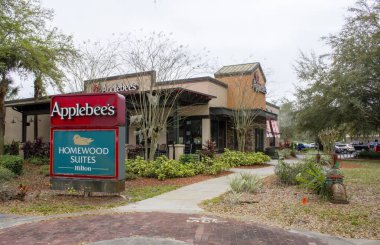 February 21, 2020 - Orlando, Florida: The exterior to the Applebees near I4 and the Homewood Suites by Hilton 