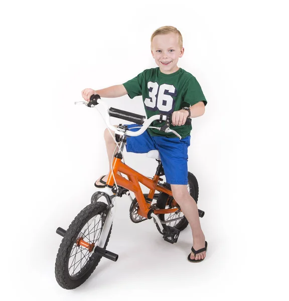 Cute boy riding his bike — Stock Photo, Image