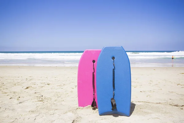 Two colorful boogie boards — Stock Photo, Image