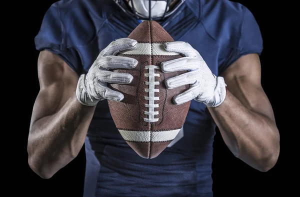 American athlete holding a ball — Stock Photo, Image