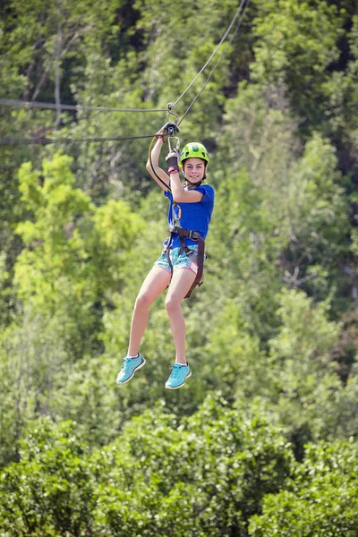 Girl Rolling Zip Wire Forest Background — Stock Photo, Image