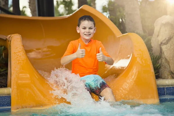 Cute Happy Boy Riding Water Slide Outdoor Waterpark Giving Thumbs — Stock Photo, Image
