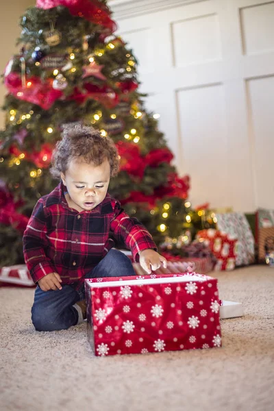 Cute Little Diverse Boy Opening Magical Christmas Present Front Christmas — Stock Photo, Image