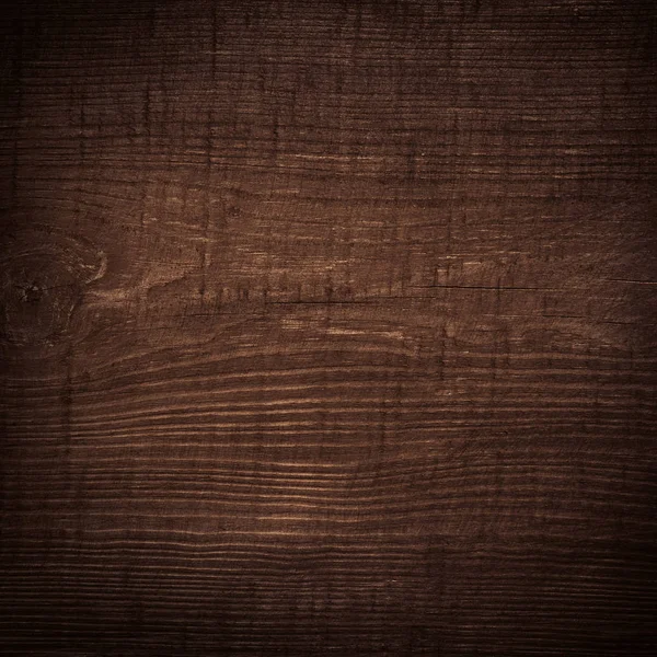 Coklat tua menggaruk papan potong kayu. Tekstur kayu — Stok Foto