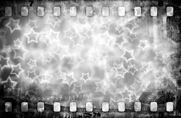 グランジ星の背景とカラフルなフィルム ストリップに傷 — ストック写真