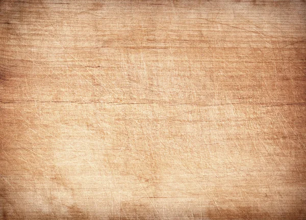 Luz marrom arranhado placa de corte de madeira. Textura de madeira — Fotografia de Stock