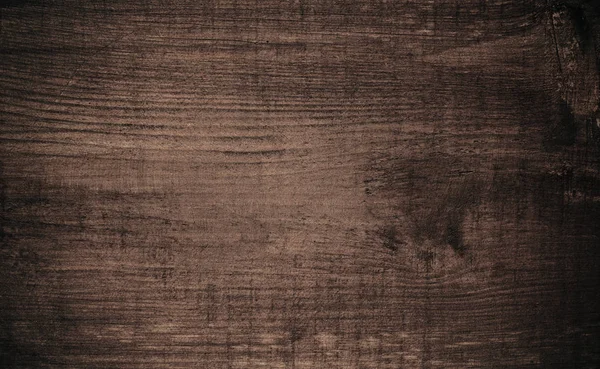 Brązowe ciemne porysowane drewniane cięcie, deska do krojenia. Tekstura drewna. — Zdjęcie stockowe