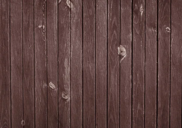 Tmavá dřevěná konstrukce s vertikální prkenná podlaha, stůl, zeď povrch. — Stock fotografie