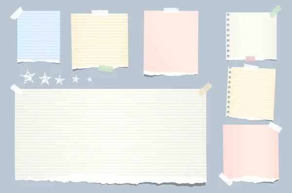 Strappato colorato, nota pastello, notebook, strisce copybook bloccato con nastro adesivo e stelle su sfondo blu . — Vettoriale Stock