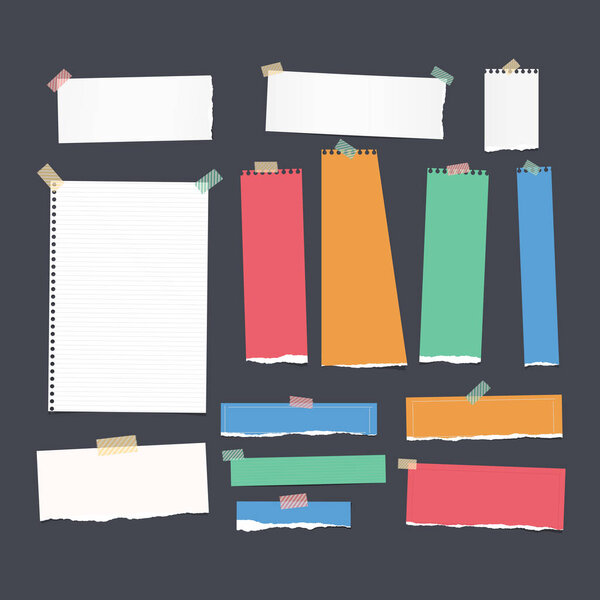 Ripped white and colorful ruled note, notebook, copybook paper strips, sheet stuck with sticky tape on black background.