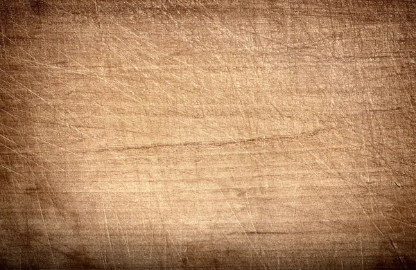 Light brown scratched wooden cutting, chopping board. Wood texture. — Stock Photo, Image