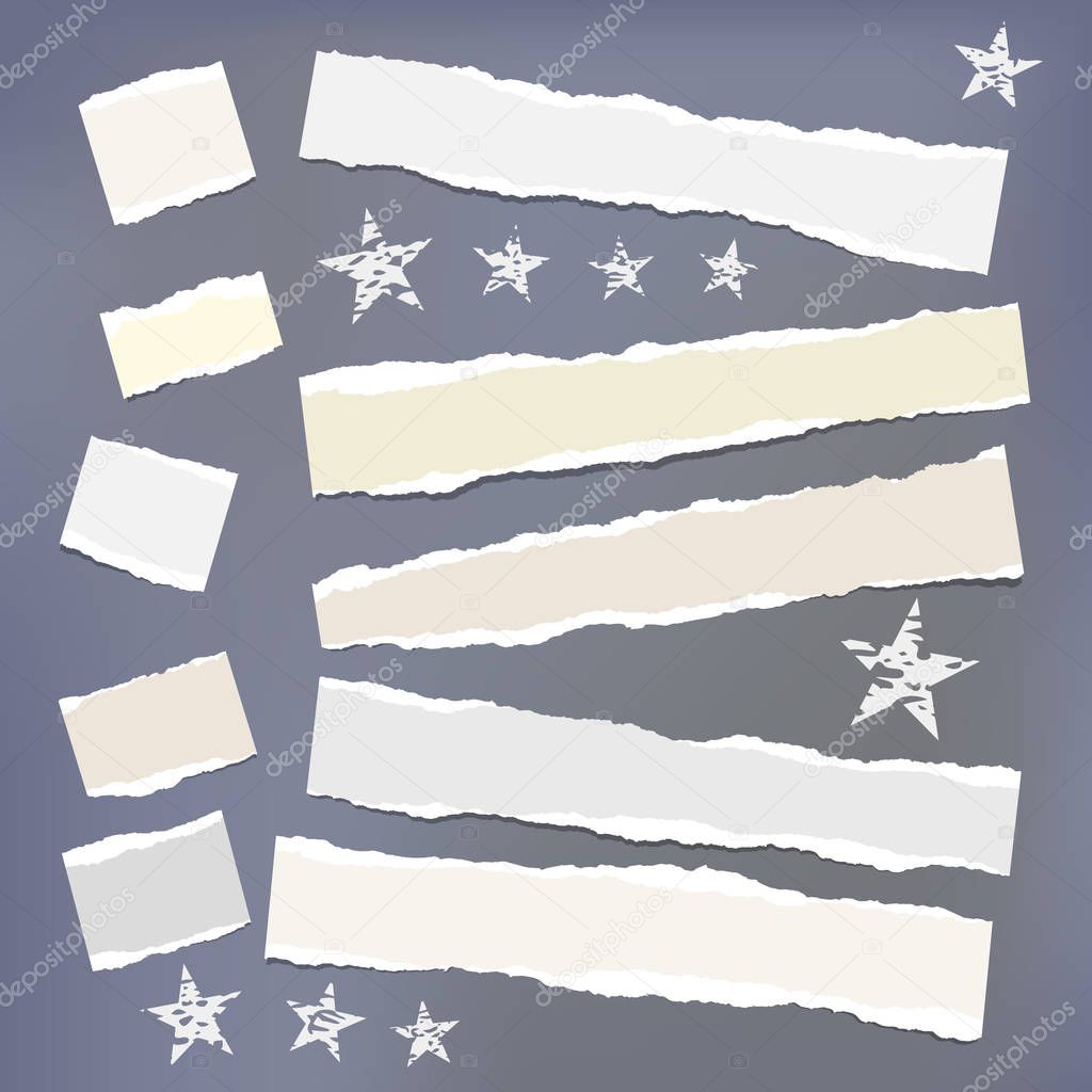 Light ripped strips, notebook, note paper with stars for text or message stuck on dark gray background.