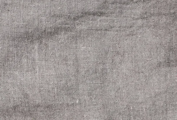 Old stained grey square creasy burlap texture. — Stock Photo, Image