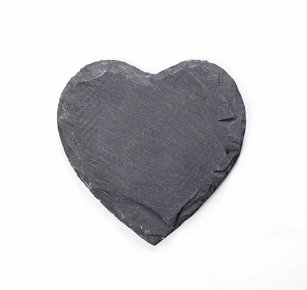 Corazón de piedra sobre fondo blanco Imagen De Stock