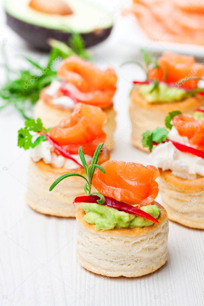 salted  puff pastry stuffed with cream cheese and smoked salmon 