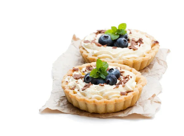 Delicious  tarts with cream and fresh blueberry isolated on whit — Stock Photo, Image