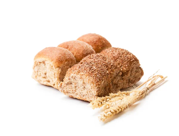 Mini housky a uši pšenice izolovaných na bílém pozadí — Stock fotografie