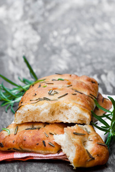 Homemade  rosemary focaccia on wooden table 