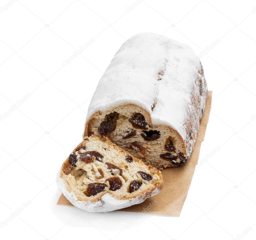 Traditional Christmas stollen fruit cake isolated on white 