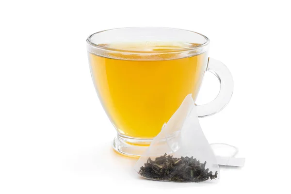 Cup of green tea with jasmine and pyramid tea bag isolated on white — Stock Photo, Image