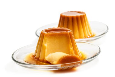 Creme caramel custard pudding isolated in white  clipart
