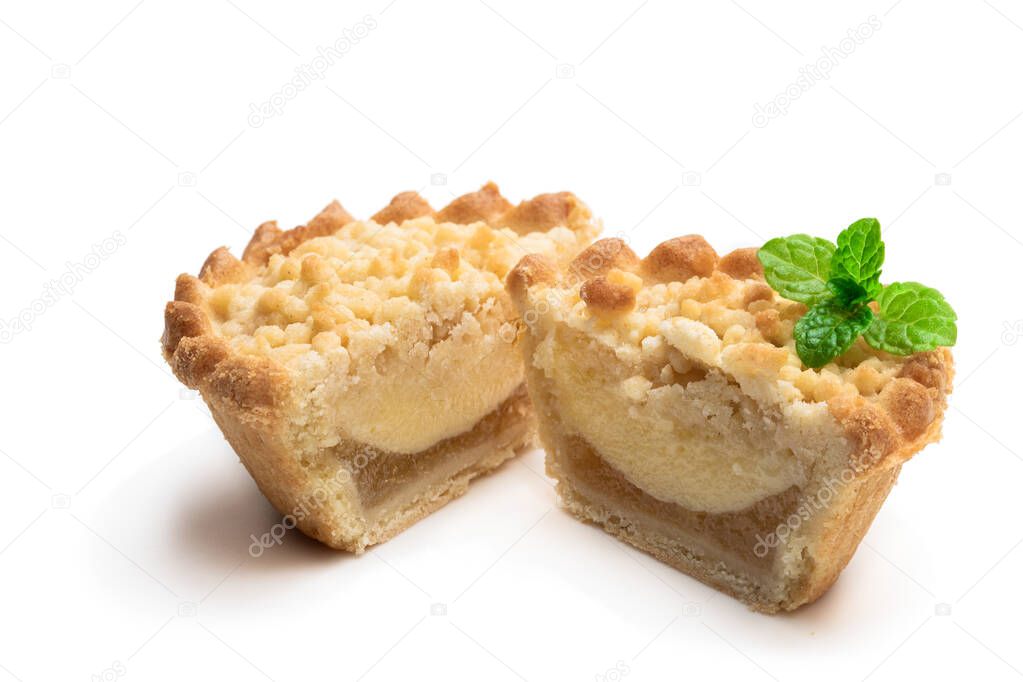 Mini apple and pear custard crumble tart isolated on white  