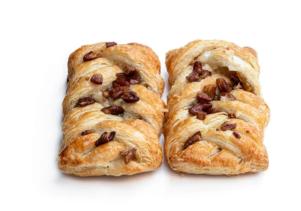 Flaky pastry filled with maple syrup and topped with pecan isolated on white — 스톡 사진