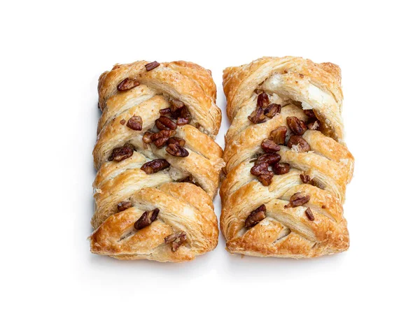 Flaky pastry filled with maple syrup and topped with pecan isolated on white — 스톡 사진