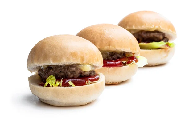 Beyaz arka planda üç mini hamburger seti. — Stok fotoğraf