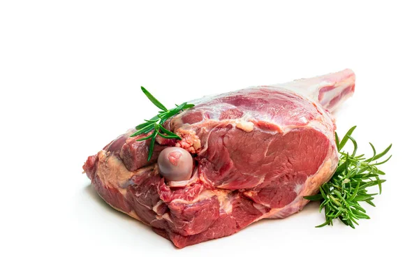 Fresh raw lamb leg with rosemary leaves isolated on white — Stock Photo, Image