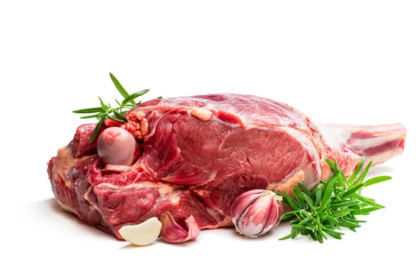 Fresh raw lamb leg with rosemary leaves and garlic isolated on white — Stock Photo, Image