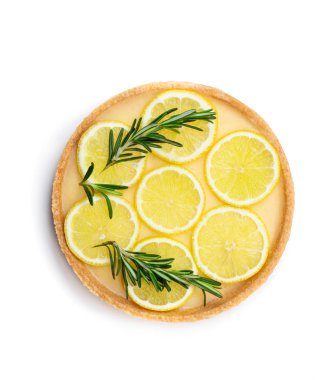 Beyaz üzerine biberiye yapraklı geleneksel Fransız limonlu tart. 