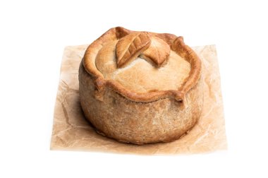 Baharatlı domuz eti ve jambonlu turta. 