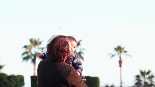 Father and child enjoy each other at the playground — Stock Video