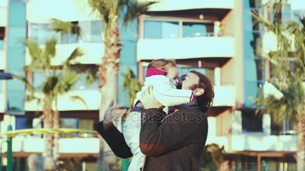 Father and child enjoy each other at the playground — Stock Video