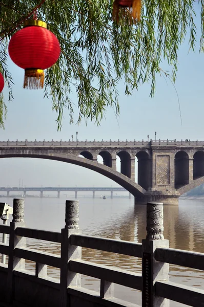 Chinese lanterns and ancient Zhaozhou bridge near Shijiazhuang city, Hebei province, China, Asia