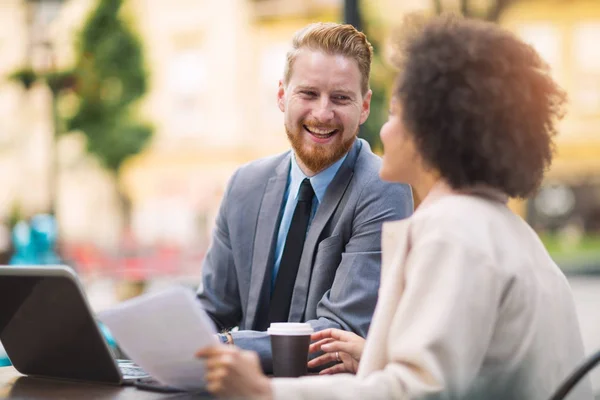 business people outside company