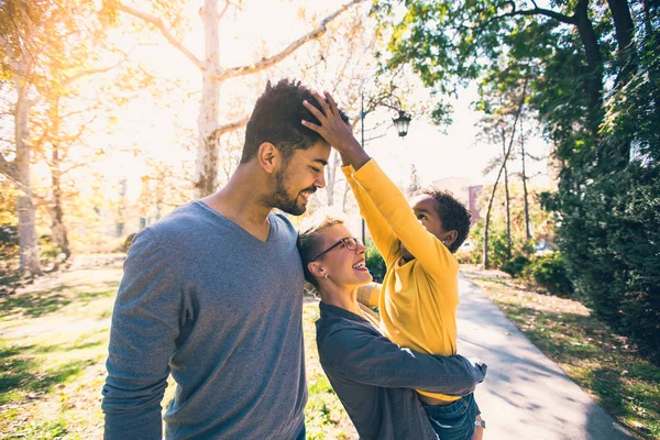 Happy Young Mixed Race Couple Spending Time Daughter Having Fun — Stock Photo, Image