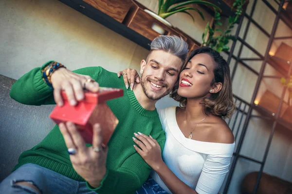 Happy Interracial Couple Sitting Cafe Bar Man Giving Gift His — Stock Photo, Image