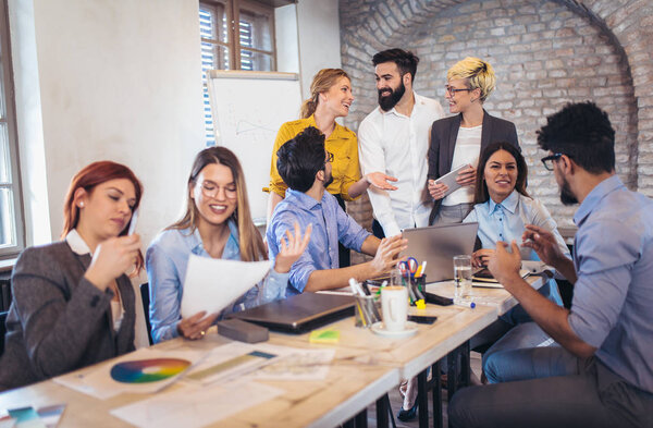 Business colleagues in conference meeting room during presentation