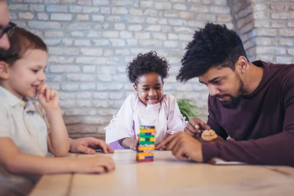 Two Fathers Children Playing Jenga Game Table — Stock Photo, Image