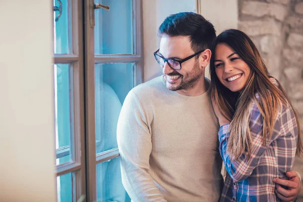 Portrait Young Couple Hugging Next Window Brick Wall Background — Stock Photo, Image