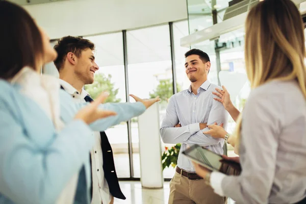 Business partners talking in modern office — Stock Photo, Image