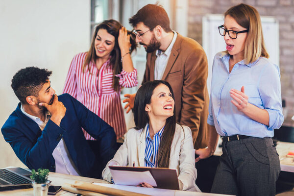 Business people working together in modern office.