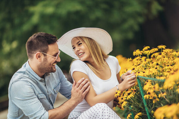 Romantic young couple having fun in the park. 